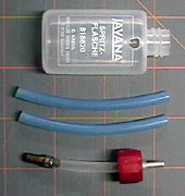 Parts to make a fuel tank from a small bottle.