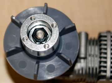 Tighten the nut securely using a socket wrench.