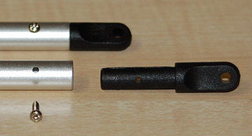 Insert the four tail support rod ends into the two tail support rods.  Use the self-tapping screws to secure them.
