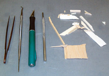 Tools used to retrieve loose pieces from inside the wing.