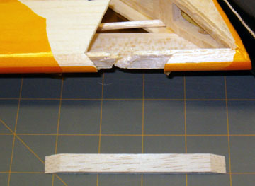 An appropriate piece of balsa is used to splice the leading edge back together.