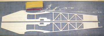Block sand the fuselage sides to bring all the joints flush and to remove excess glue.