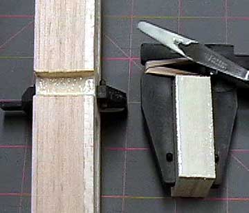Stack the ribs together and add glue to the spar notches.