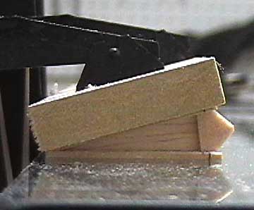 The upper sheeting glued in place using a flat board as a clamp.