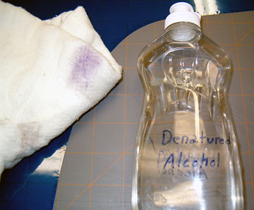 After the film is cut to size, remove the marker with with alcohol.