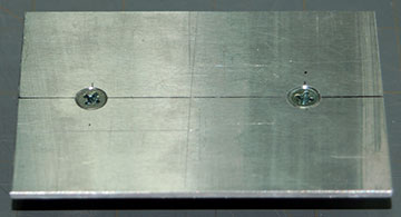 Counter-sink the holes so the screws are level with or below the plat surface.