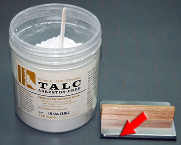A little talc removes the stickiness from the exposed glue on the foam.