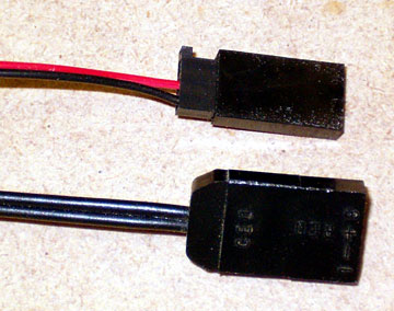 A "universal" female plug and a Futaba plug.