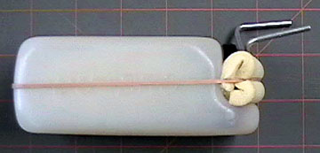 A piece of foam rubber attached to the front of the tank has several useful purposes.
