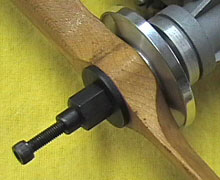 The spinner bolt shown threaded into the adapter nut.