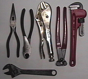 Pliers, wrenches and Vise-Grips are all useful in any shop.