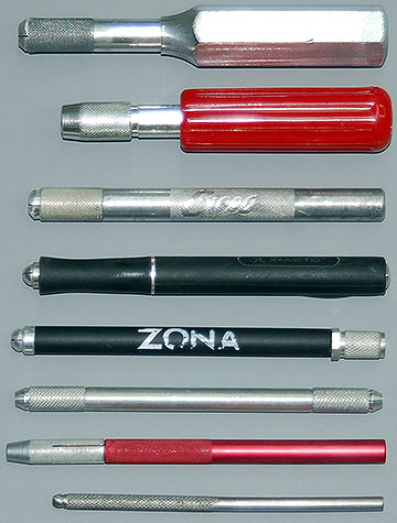 Various hobby knife handles.